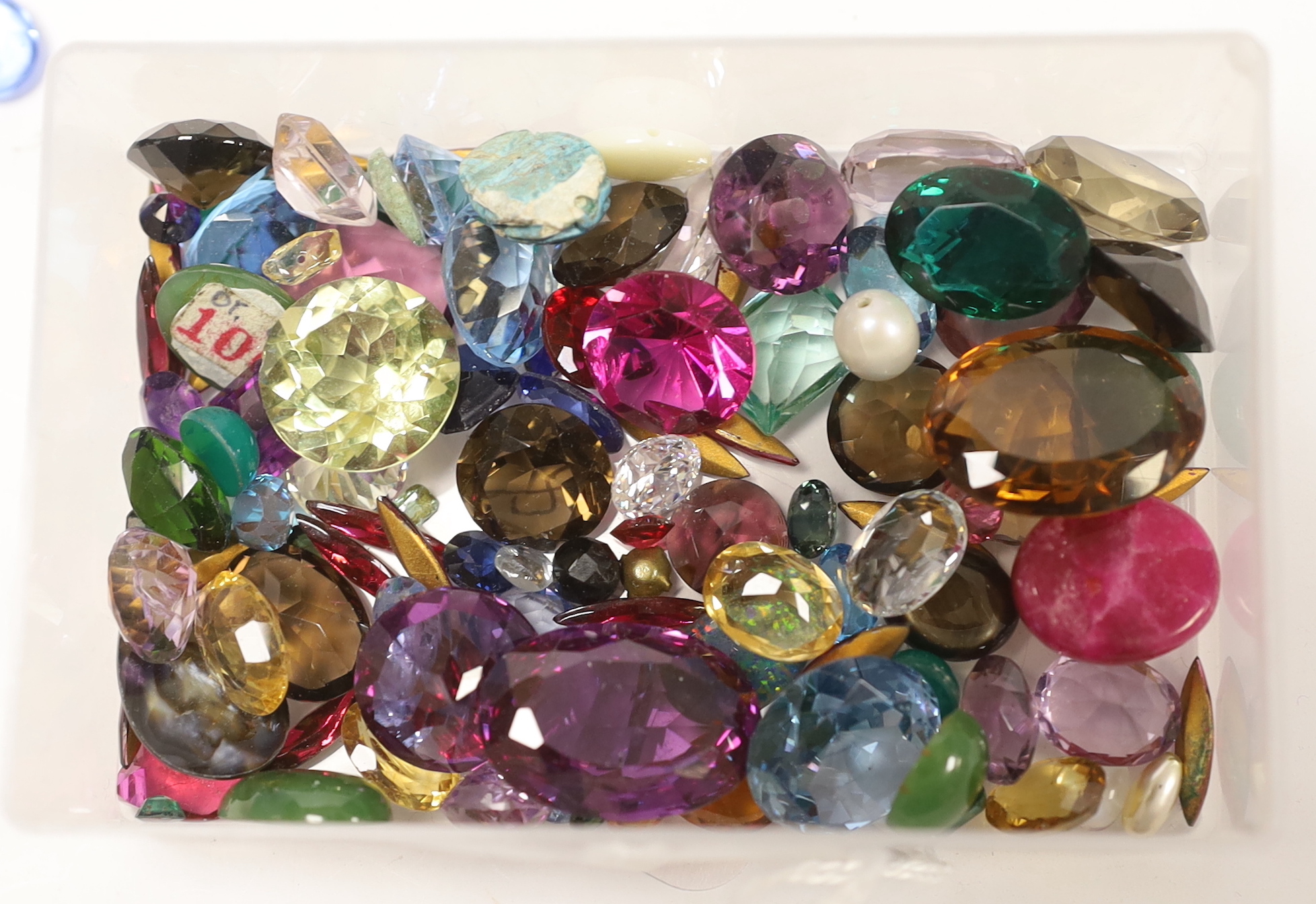 A quantity of assorted mainly unmounted cut and cabochon gemstones.